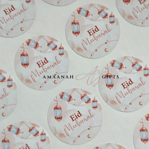 Ronde Eid Mubarak stickers met islamitische lantaarns in zachte roze tinten